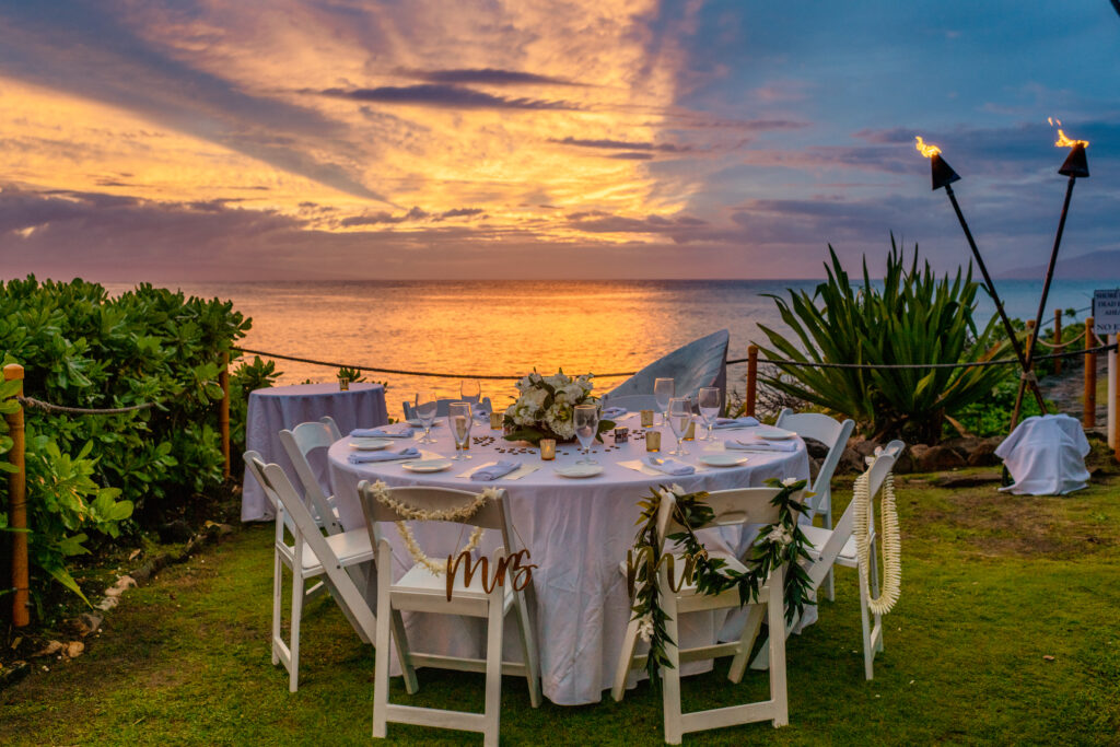 Detail shot of wedding table decor during a Maui wedding at sunset