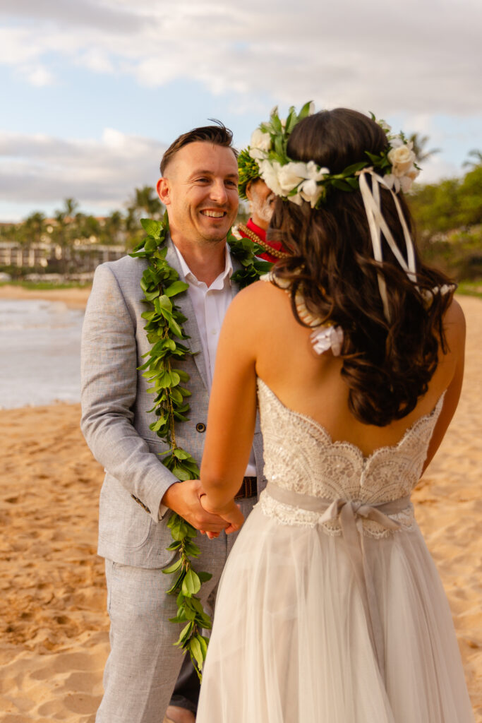 Romantic beach portraits taken during a Maui elopement