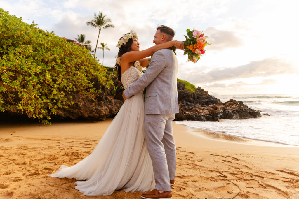 Candid moment between newlyweds during a Maui elopement