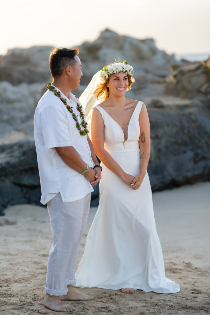 Bride smiling during Maui beach ceremony at Ironwood Beach Kapalua

