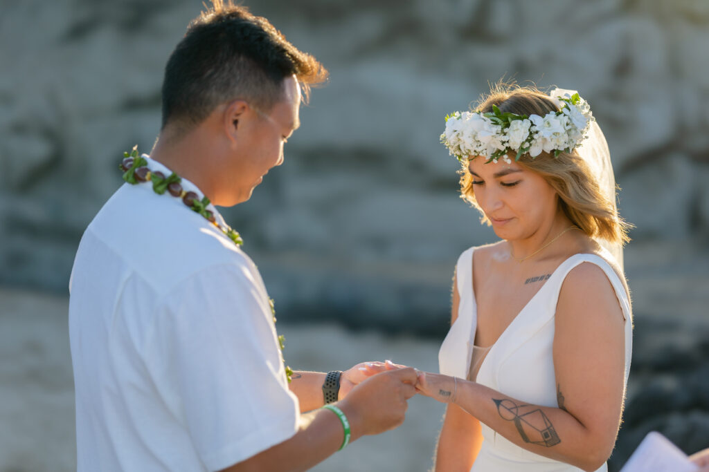 Ring exchange at Ironwoods Beach Maui Wedding ceremony
