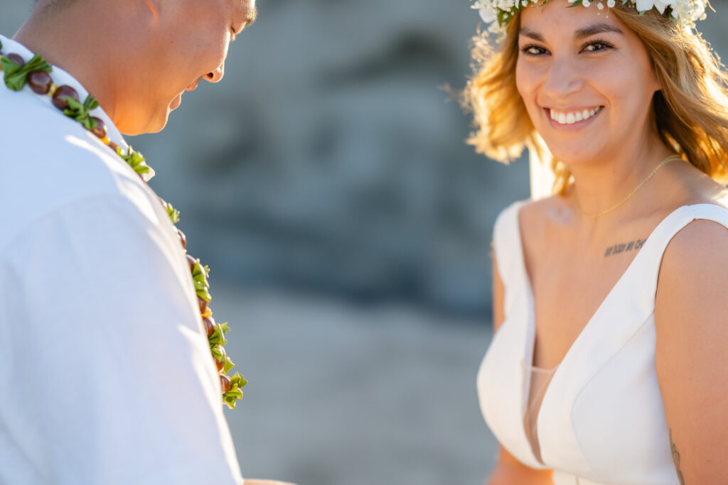 Bride smiling during vows at Ironwoods Beach Kapalua
