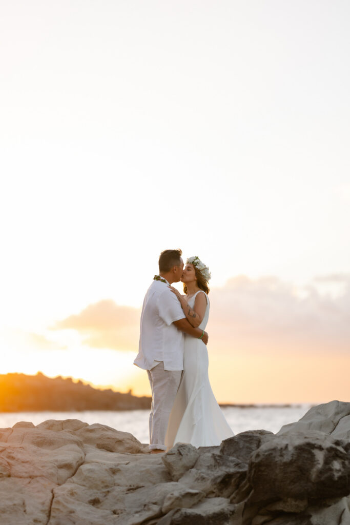 Sunset kiss on the rocks at Ironwoods Beach Maui