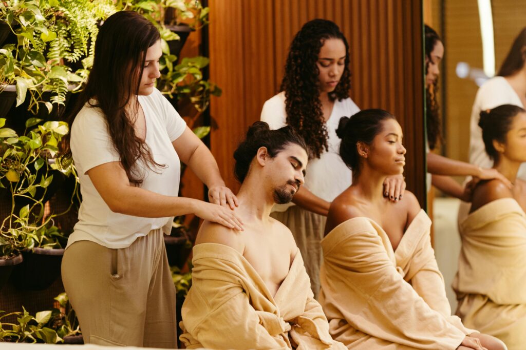 Couple enjoying a relaxing spa massage experience during their Maui honeymoon